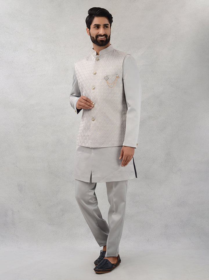 Ideal for all occasions, this designer grey silk kurta pajama ensures you shine at every event.