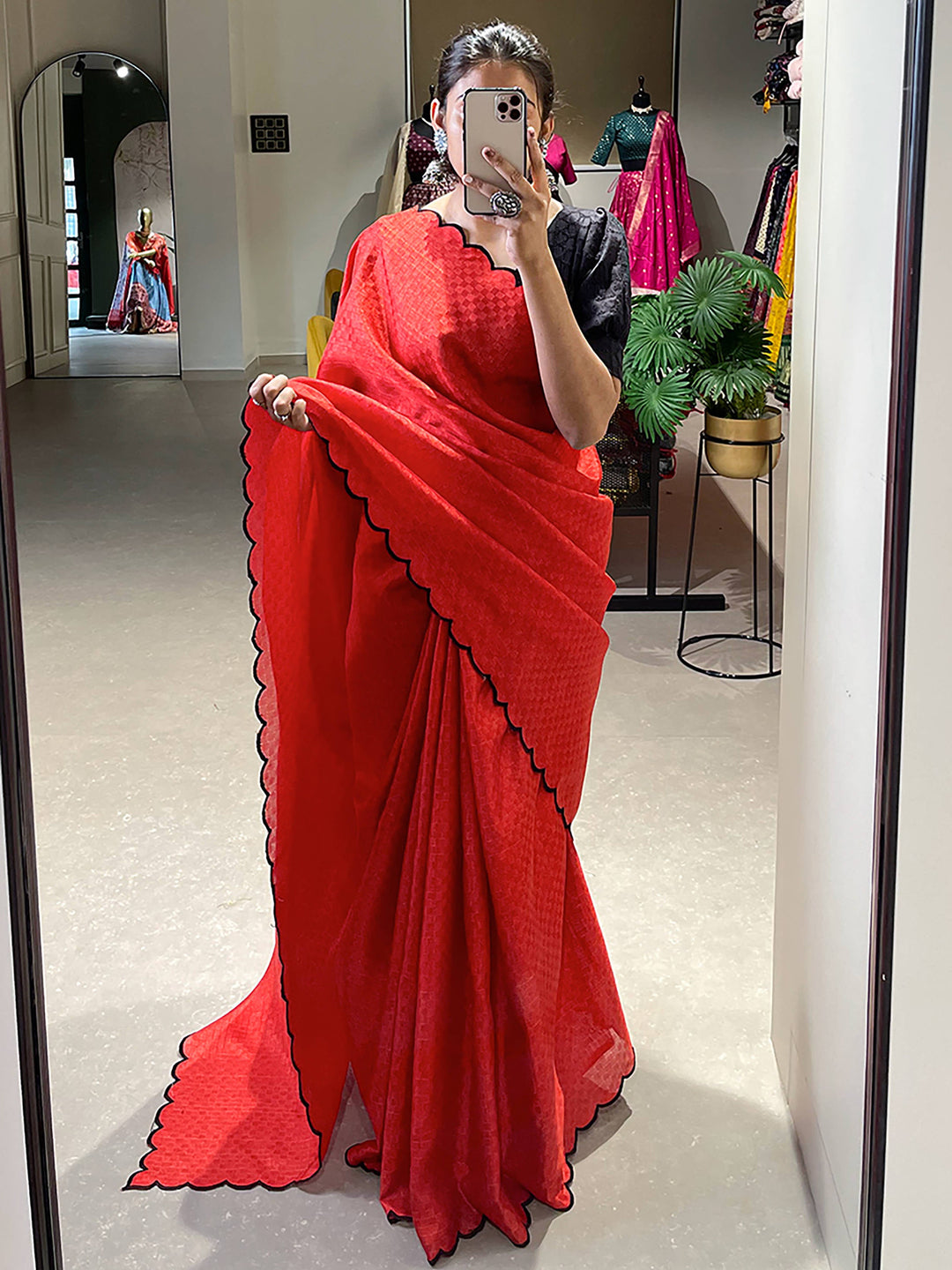 Red cotton saree crafted for elegance and style.