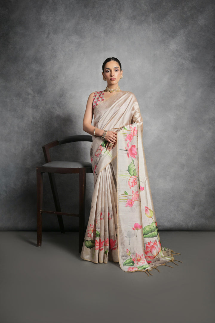 Graceful Tussar silk saree with lotus print pallu and running blouse piece