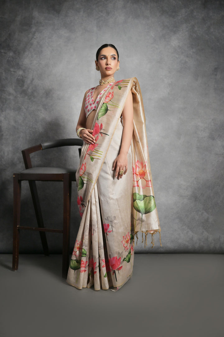 Tussar silk saree with floral and lotus designs, ideal for festivals