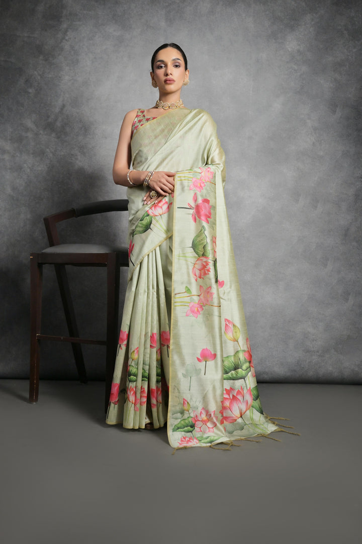 Tussar silk saree adorned with lotus and floral prints, perfect for celebrations