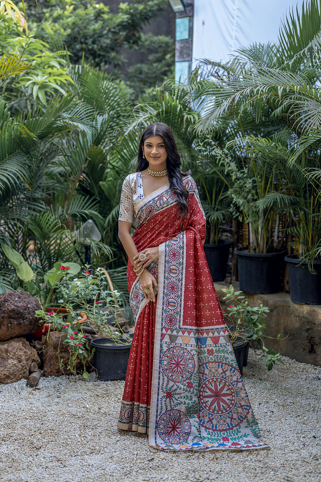 Tussar saree with intricate Madhubani pallu and vibrant Bandhani pattern