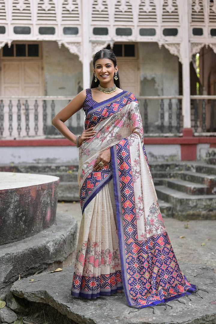 Tussar silk saree featuring floral jal design with Patola pallu and border