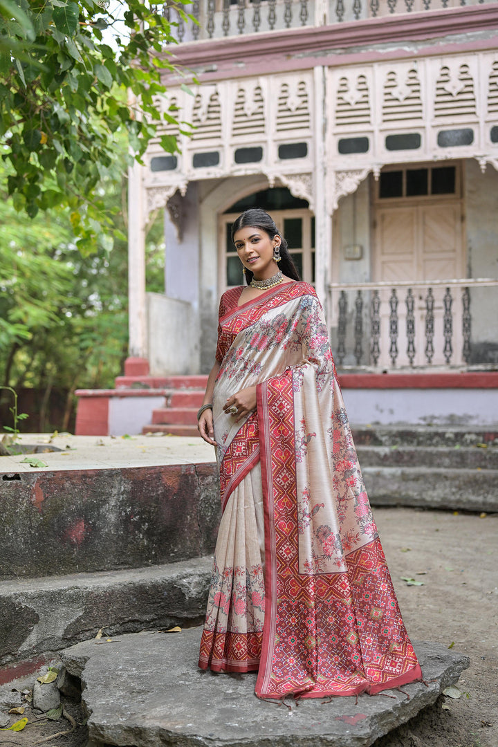 Traditional Tussar silk saree with Patola border and contrast blouse piece