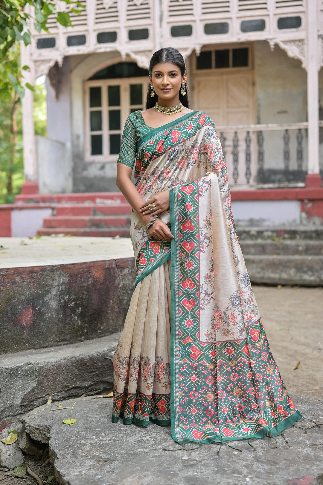 Soft Tussar silk saree with Patola border and classic floral design