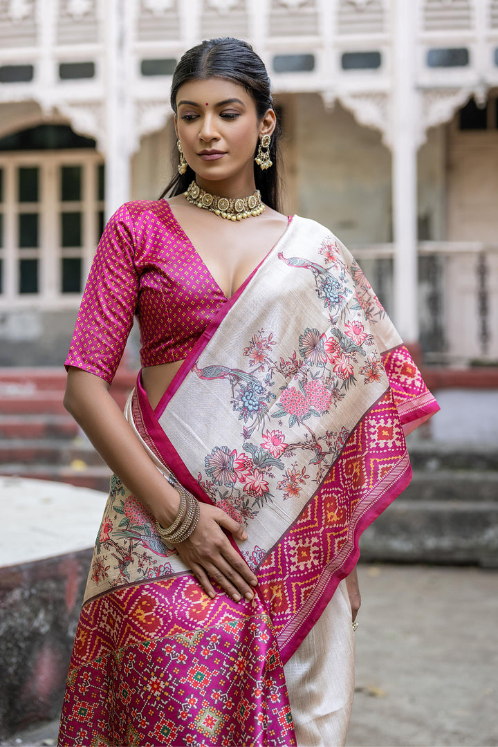 Traditional Tussar silk saree featuring floral and Patola designs