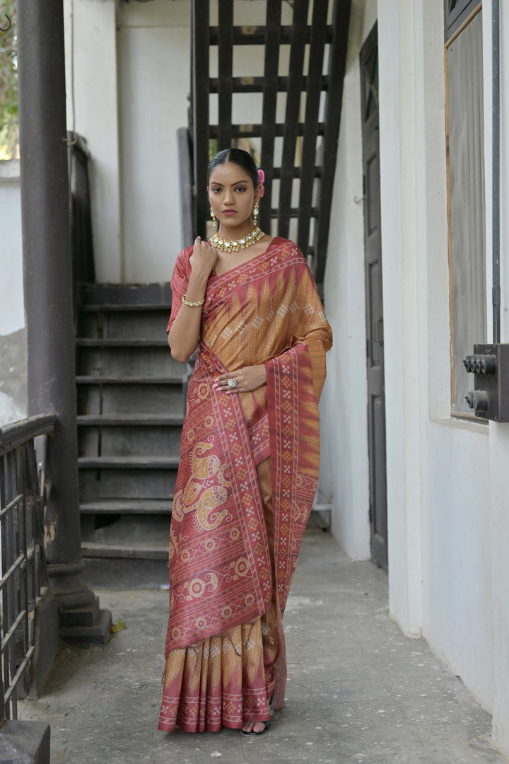 USA-inspired Tussar silk saree with temple-printed details and tassels