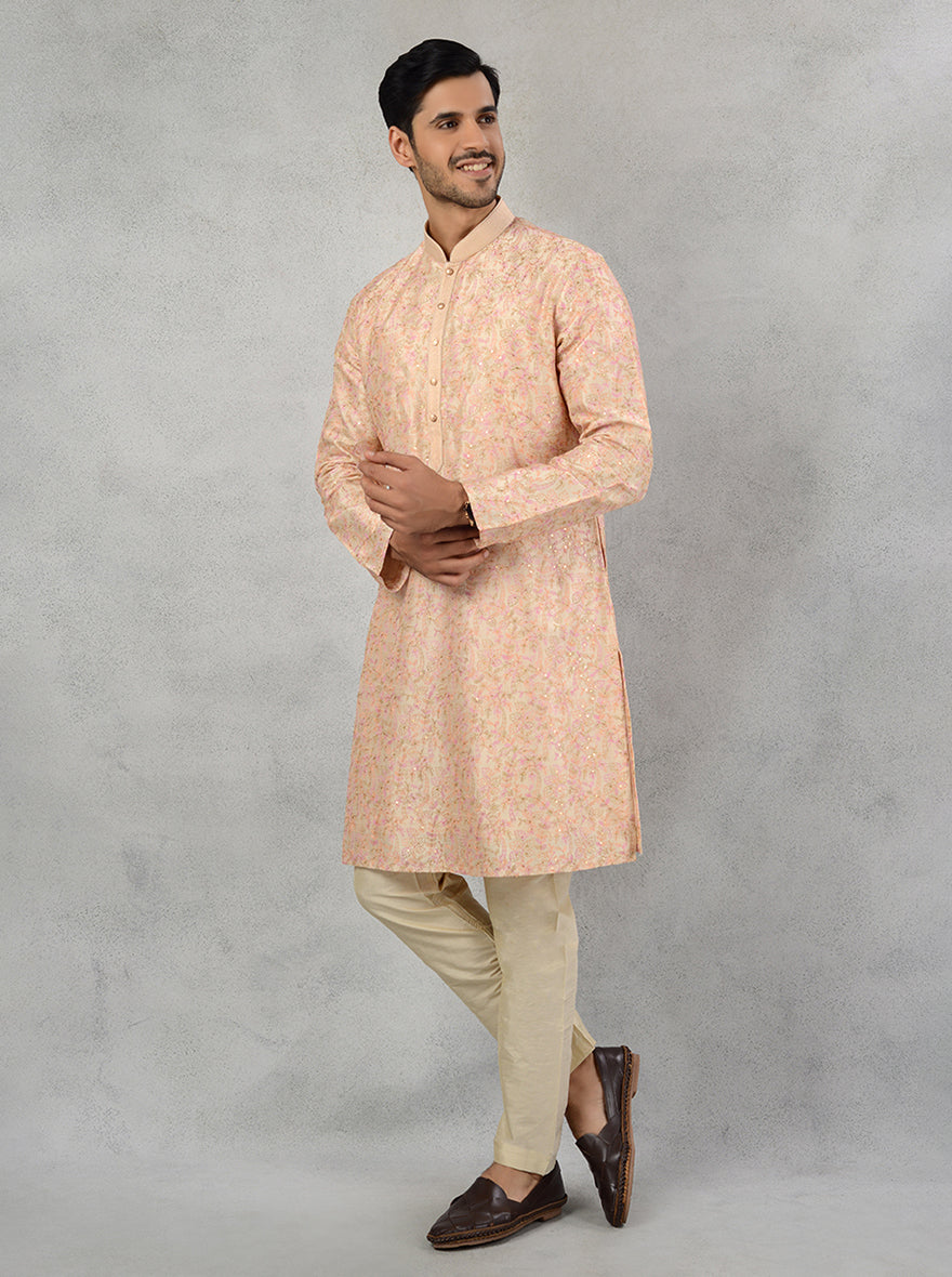 Discover timeless style with our fawn multi silk blend kurta pajama featuring intricate embroidery.