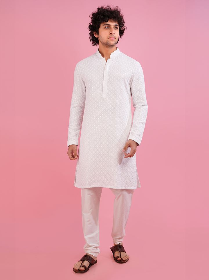 Celebrate haldi ceremonies in style with this white silk blend kurta pajama, perfect for festive occasions in the USA.