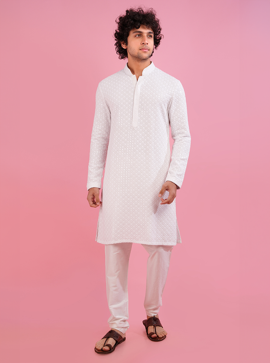 Classic white kurta pajama set for men, ideal for traditional and festive occasions.