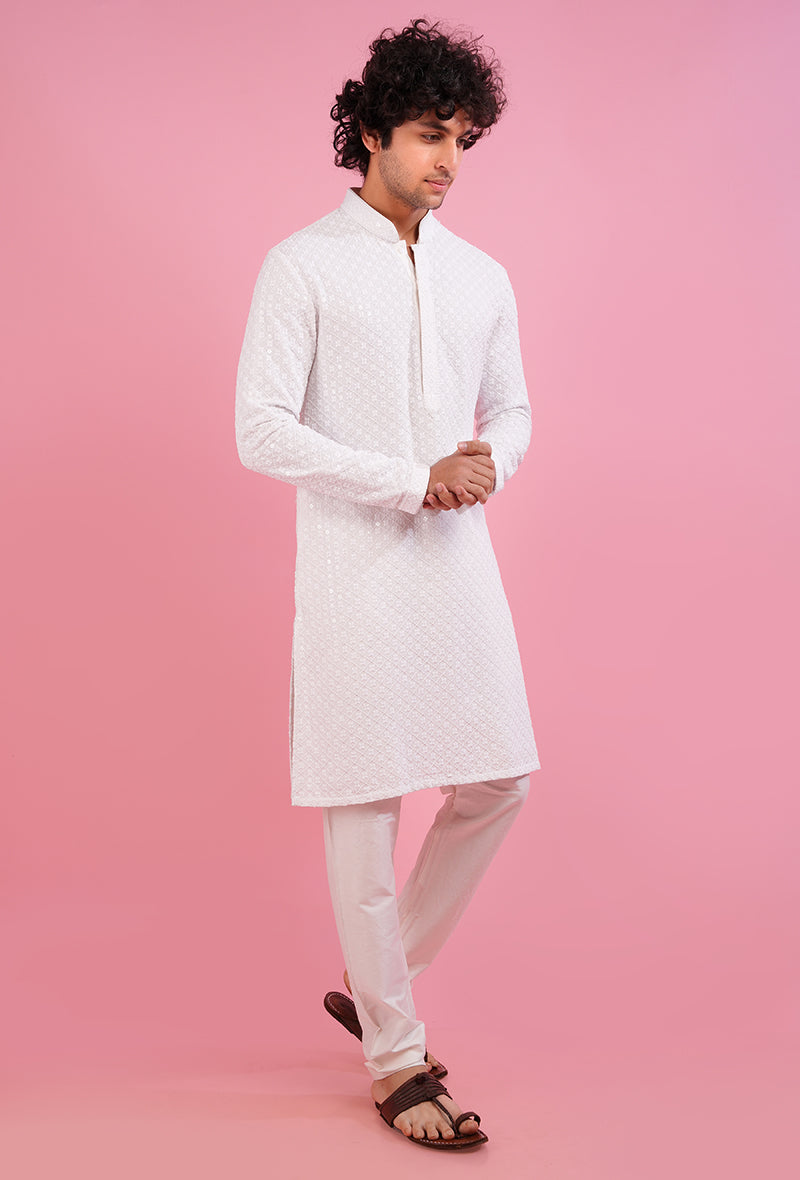 Enjoy the luxurious feel of this white silk blend kurta pajama, ideal for festive gatherings in the USA.