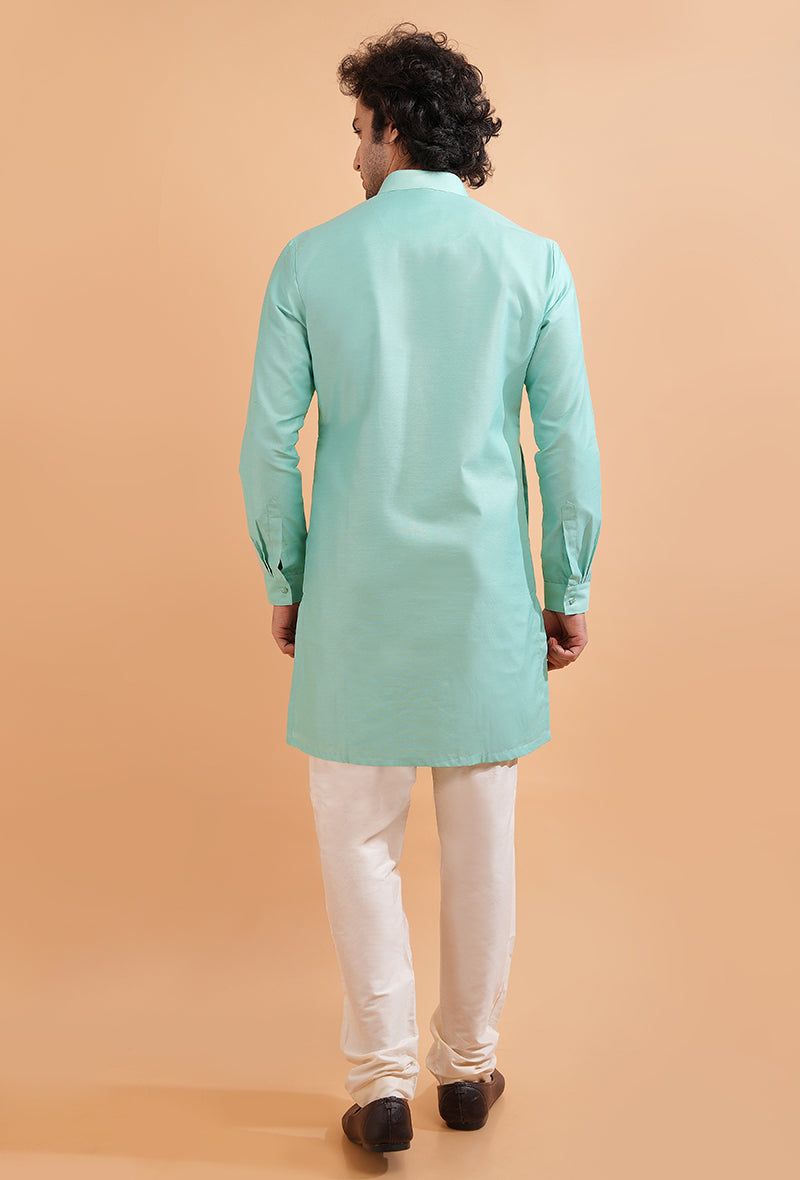 Enjoy the luxurious feel of this Aqua Blue Silk Blend Kurta Pajama, designed for modern men.