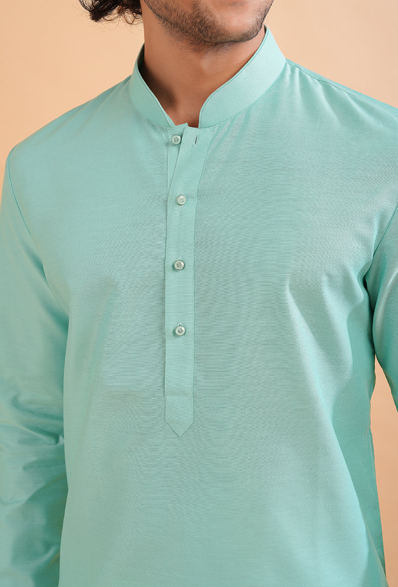 Men's aqua blue kurta pajama set for festive events, designed with embroidered accents.