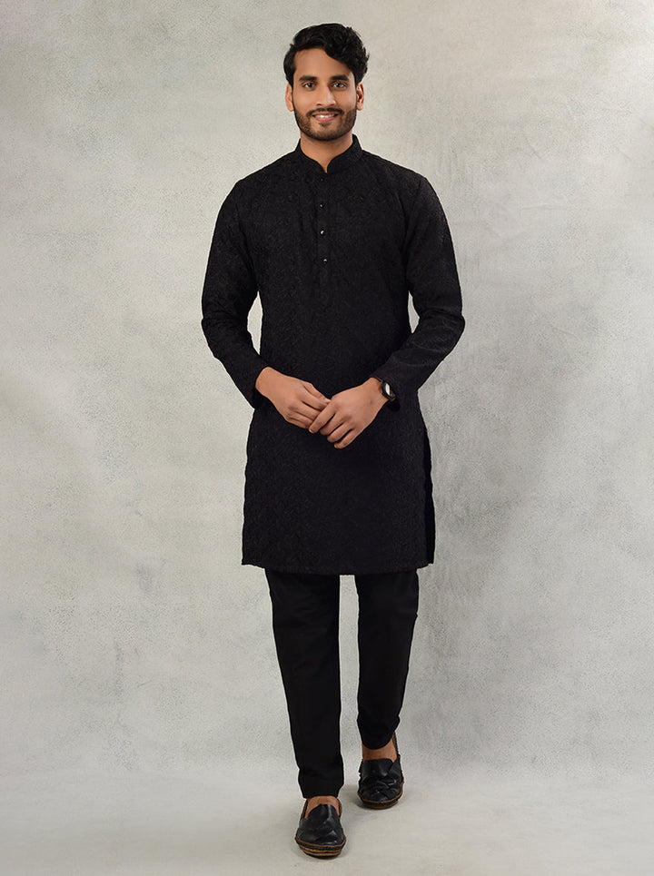 Stylish black kurta pajama featuring intricate embroidery, designed for comfort during celebrations in the USA.