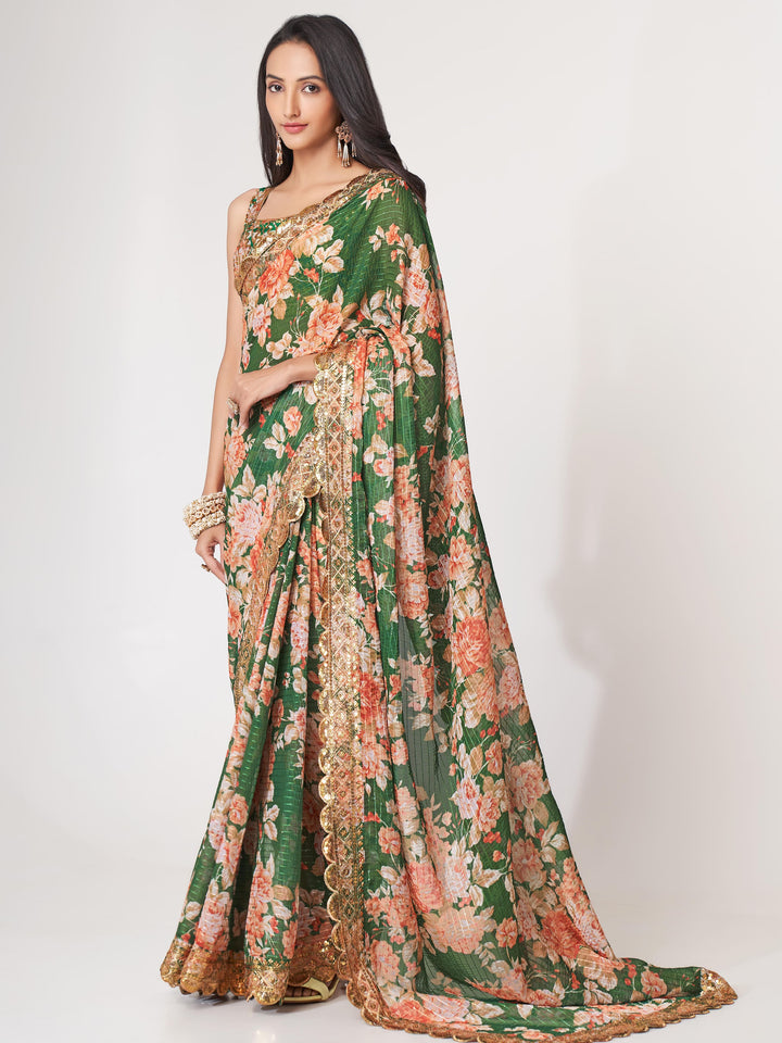 Green luxurious fabric saree crafted for elegance and style.