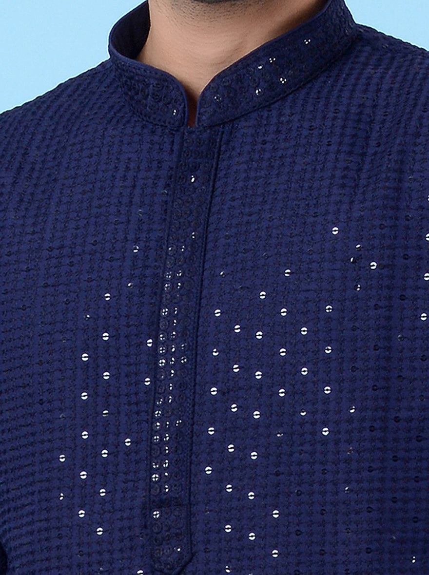 Blue silk kurta for men, designed with sequins work for a perfect ethnic look for special events.