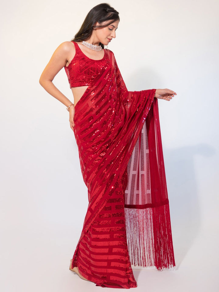 Red georgette saree crafted for elegance and style.