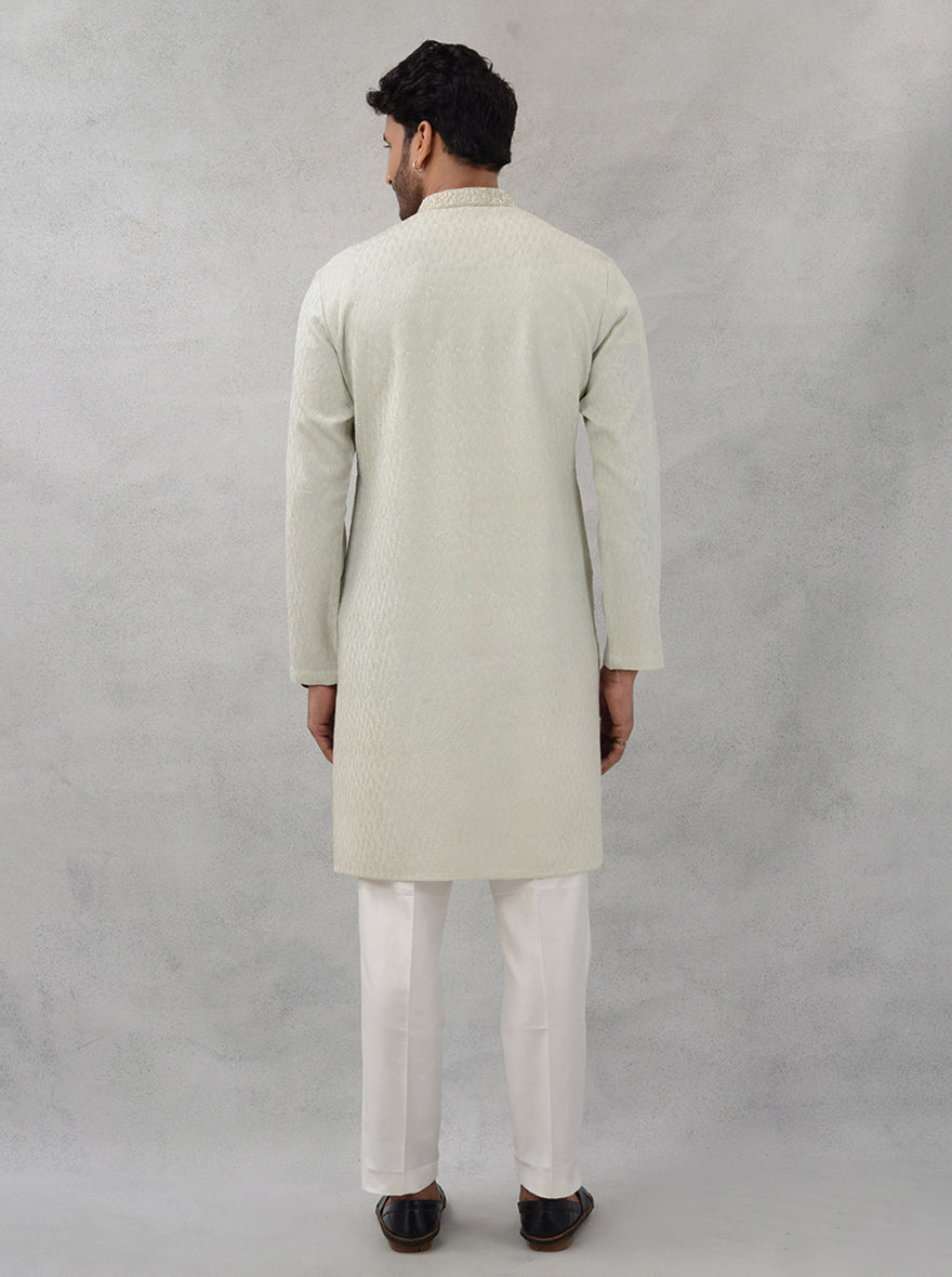 Luxurious georgette kurta set in pista green, designed for modern men celebrating in the USA.