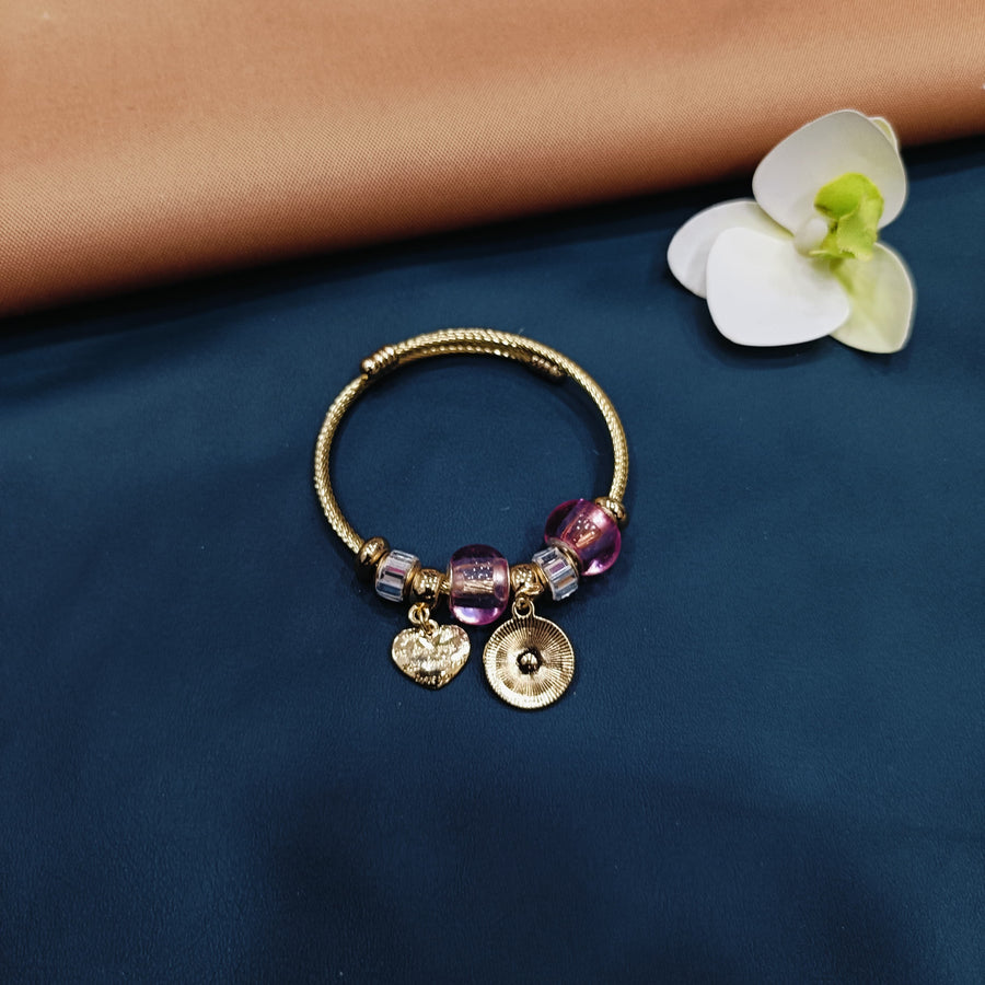 Intricate Pandora bracelet featuring handmade charms, perfect for a unique and personal touch.