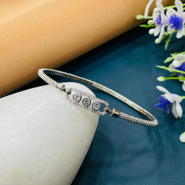 Sophisticated AD diamond bracelet, perfect for any event.