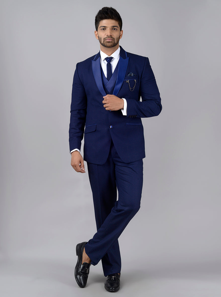 Royal blue wedding suit for men, stylish tuxedo designed for special events, offering elegance and sophistication.