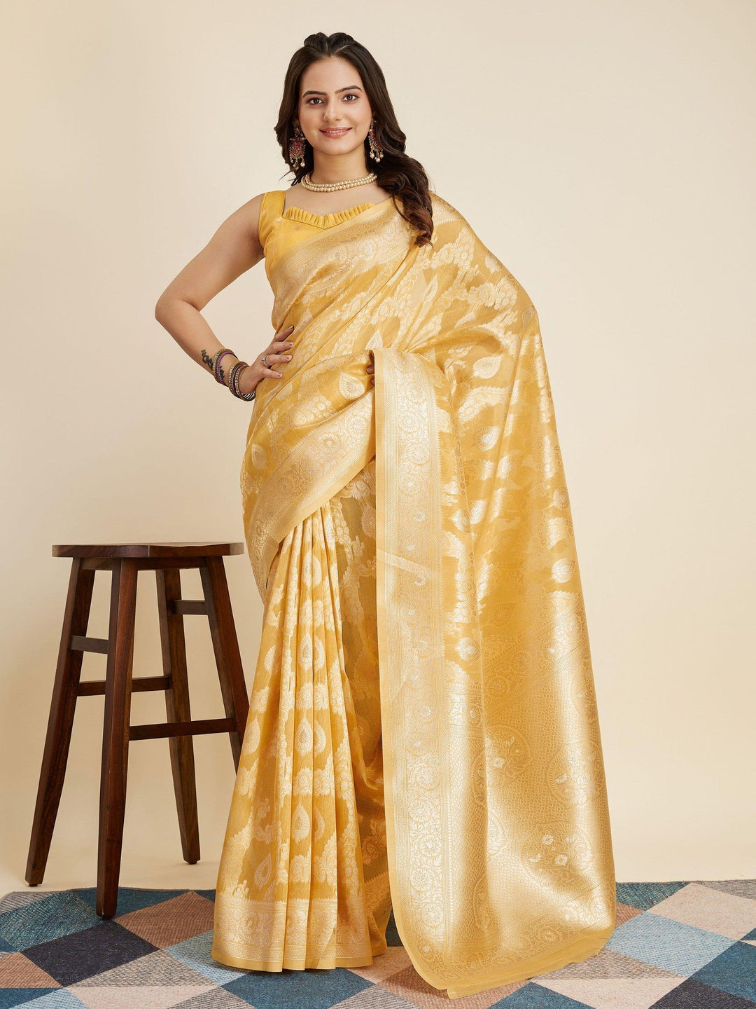 Yellow silk saree crafted for elegance and style.