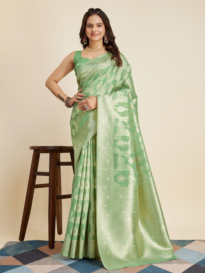 Green silk saree crafted for elegance and style.