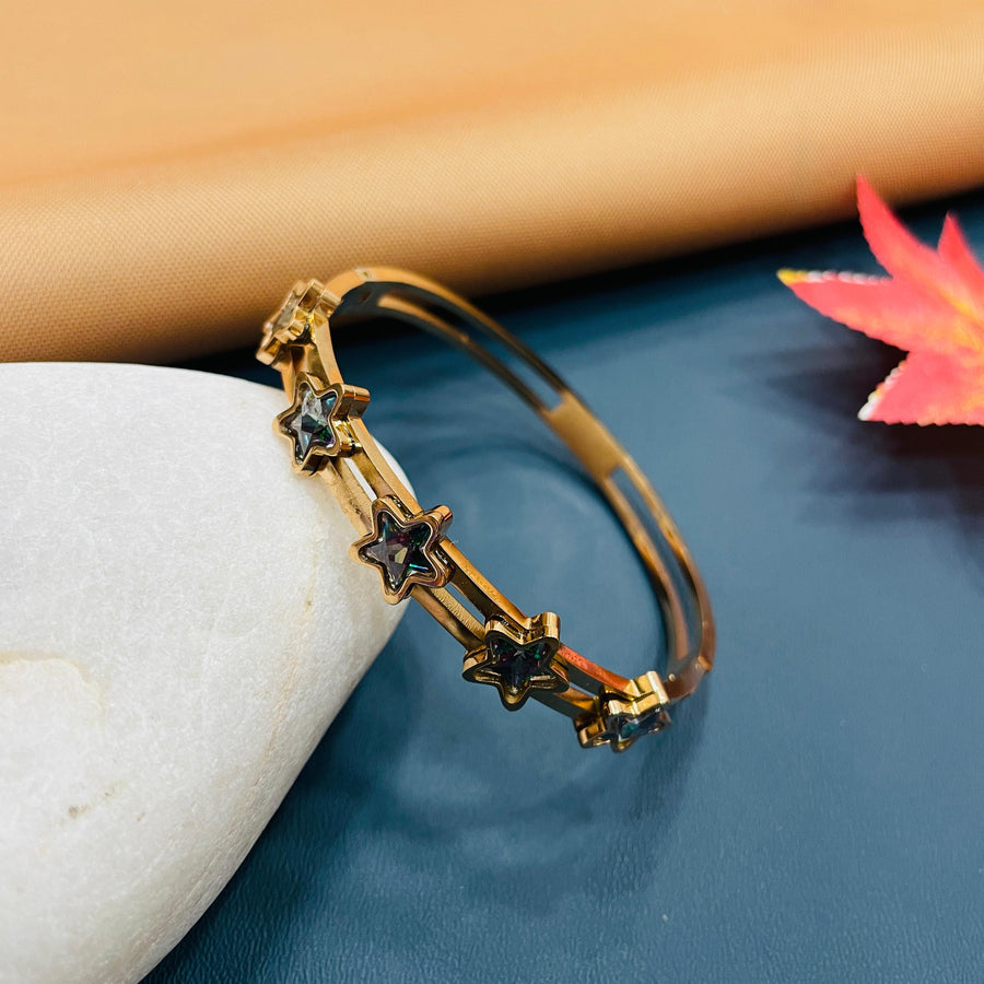 Fashionable rose gold cuff bracelet with a simple twist, perfect for unique style.