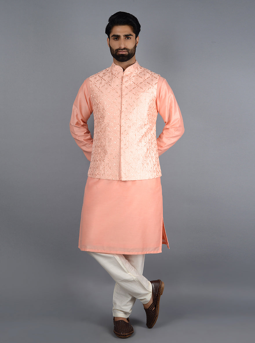 Exquisite pink Bandhgala jacket made from silk blend, featuring intricate detailing for a sophisticated look.