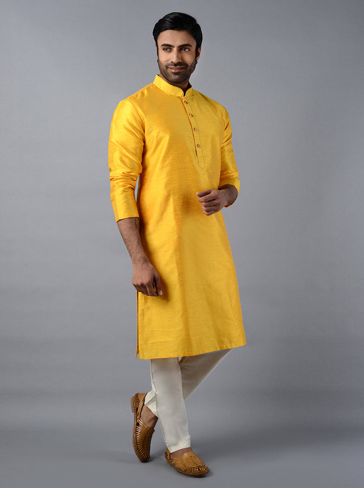 Celebrate in style with this vibrant yellow kurta set, designed for modern festivities.