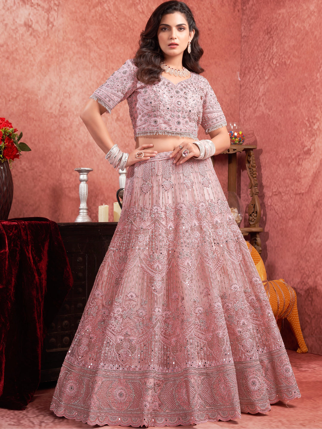 Attractive Pink Mirror Work Net Bridal Lehenga Choli With Dupatta