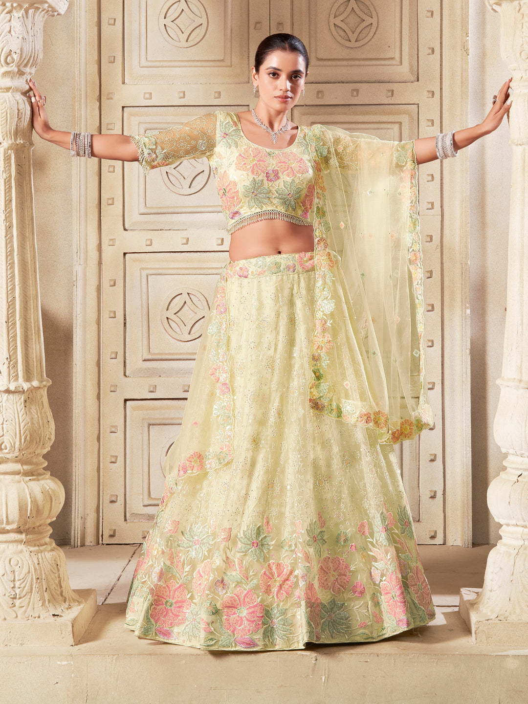 Attractive Yellow Sequins Net Wedding Lehenga Choli With Dupatta