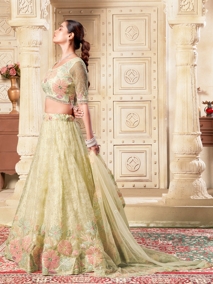 Attractive Yellow Sequins Net Wedding Lehenga Choli With Dupatta