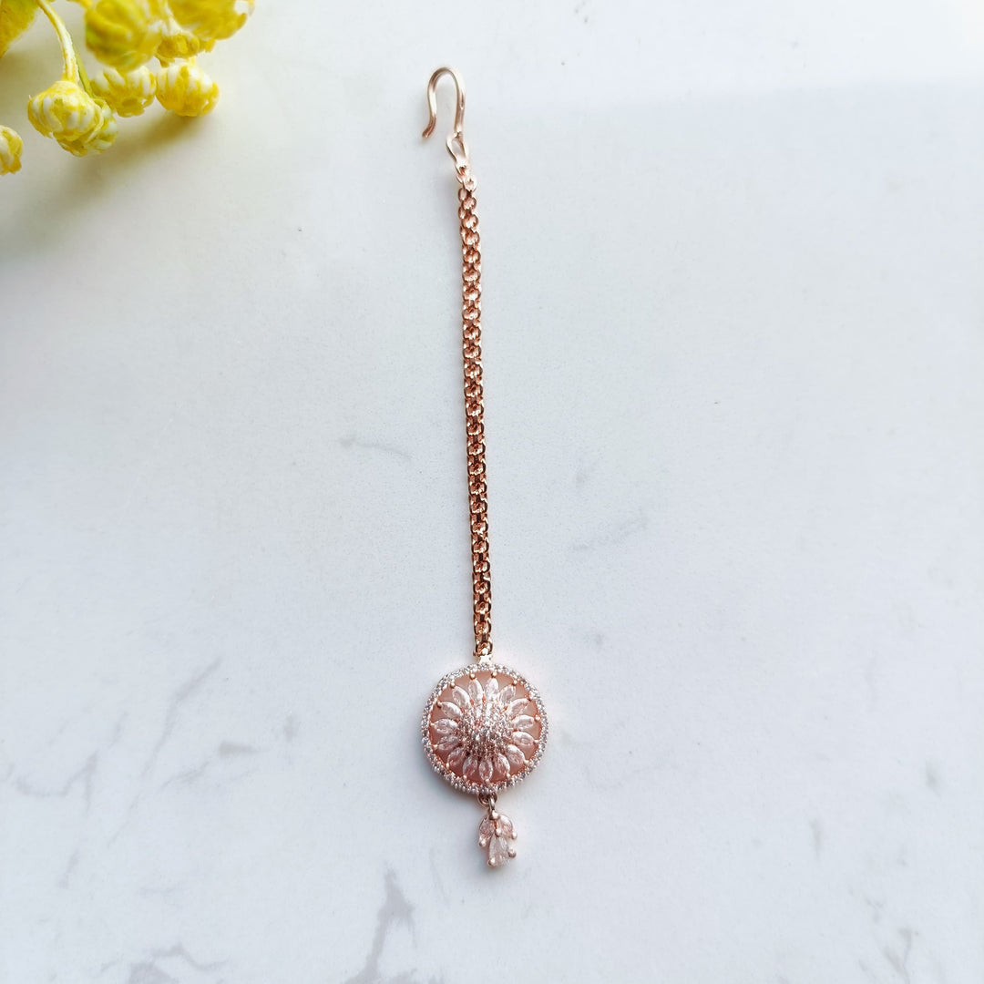 Gorgeous rose gold mang tika, a stylish accessory for festive occasions.