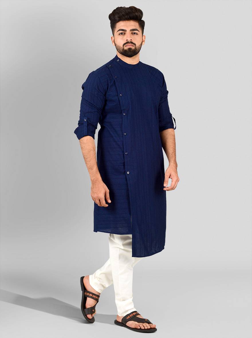 Navy blue stripe kurta set for men in the USA, featuring a bold stripe pattern and asymmetric hem.