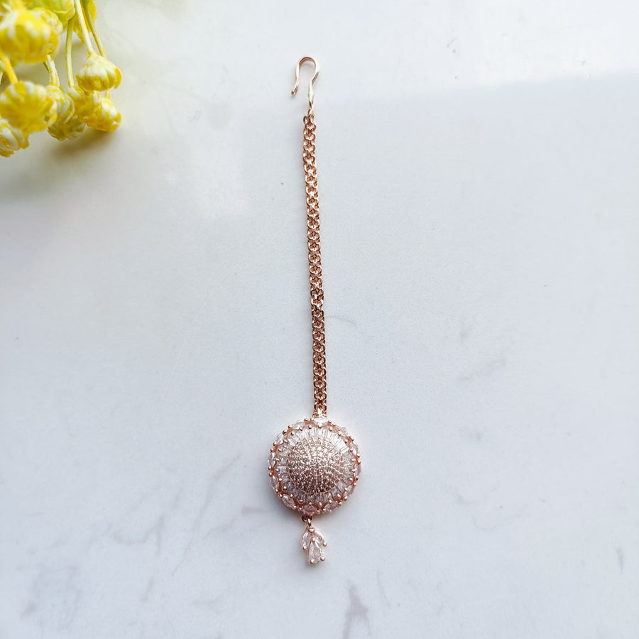 Elegant rose gold mang tika that captures the essence of bridal beauty.