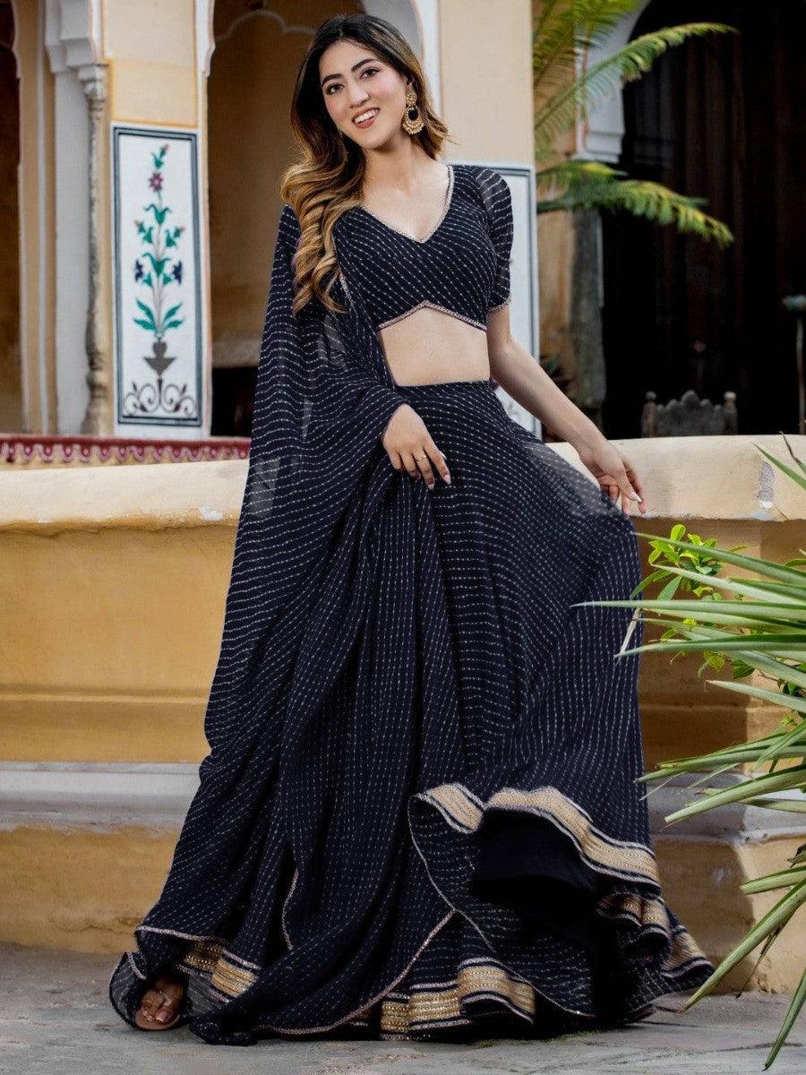 Elegant black lehenga with Gotta patti lace detail for events.