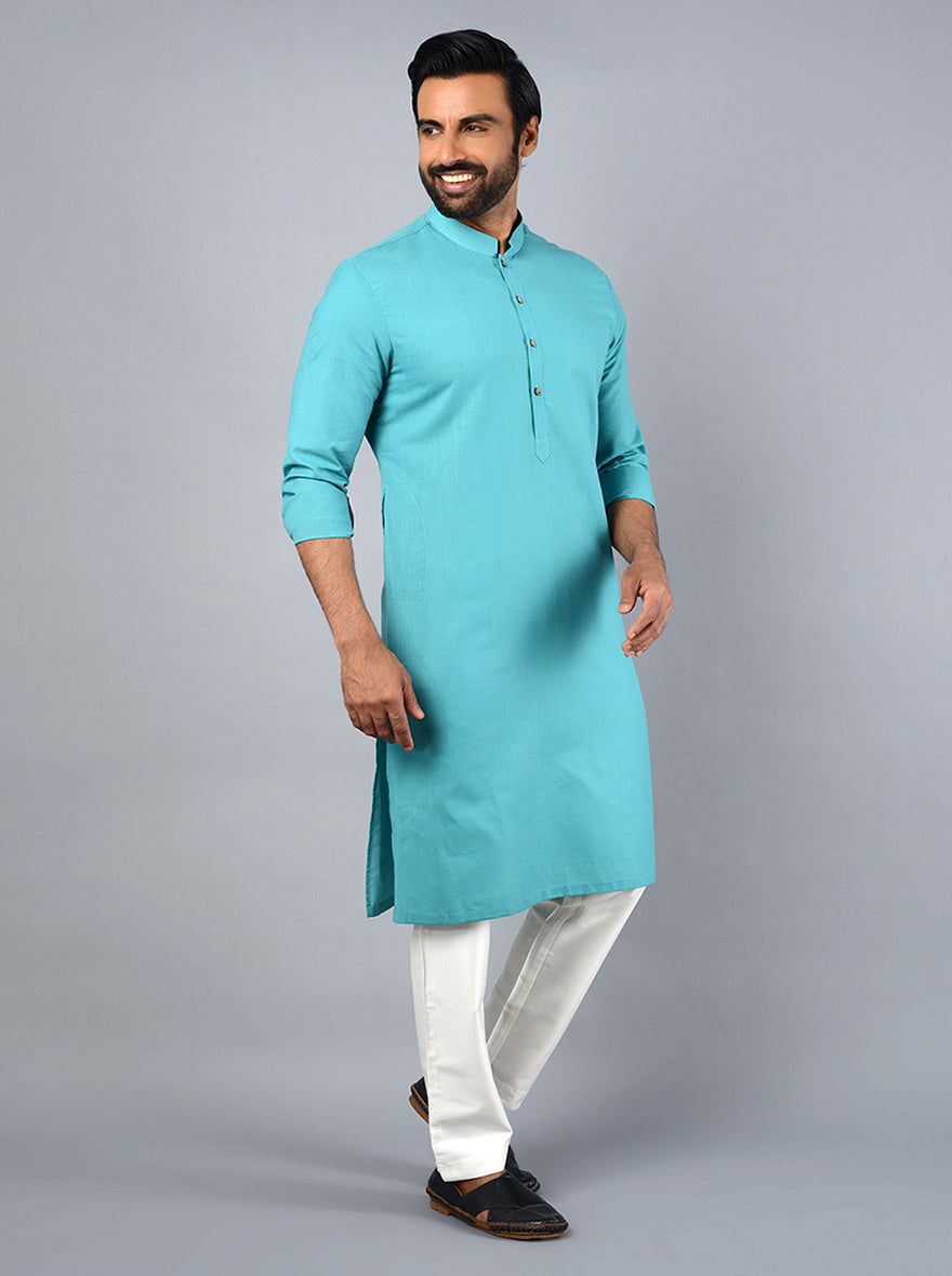 Make a statement at celebrations with our stylish sea blue kurta set, ideal for weddings.