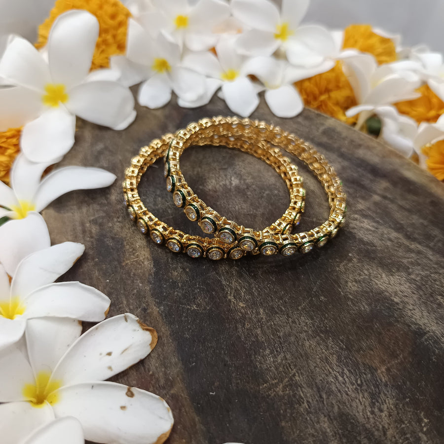 Golden bangles that celebrate tradition while embracing modern design.