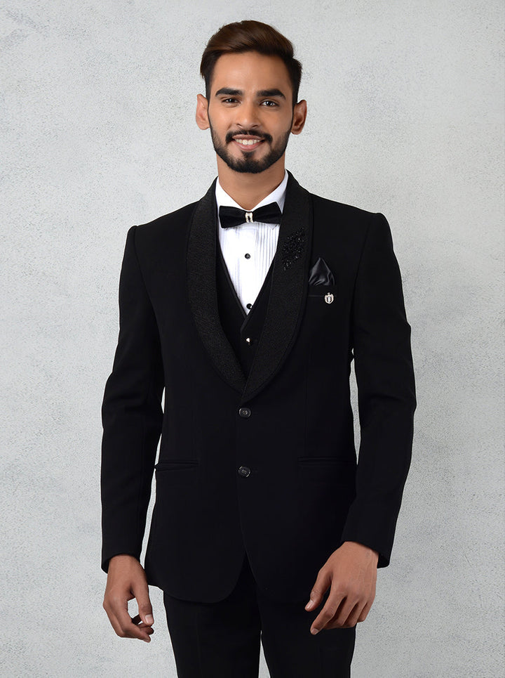 Timeless black tuxedo with stylish embroidery on the lapel, perfect for formal wear, providing a sharp and elegant look.