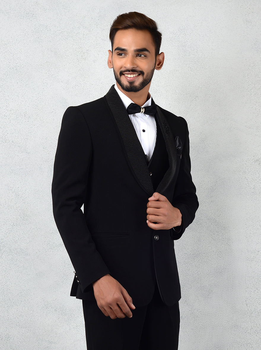 Elegant black tuxedo with stylish lapel embroidery, ideal for weddings, proms, and formal gatherings, ensuring a sharp look.