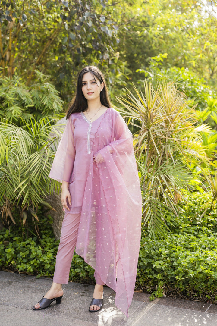 Charming onion pink suit set, designed for comfort and elegance in professional settings.