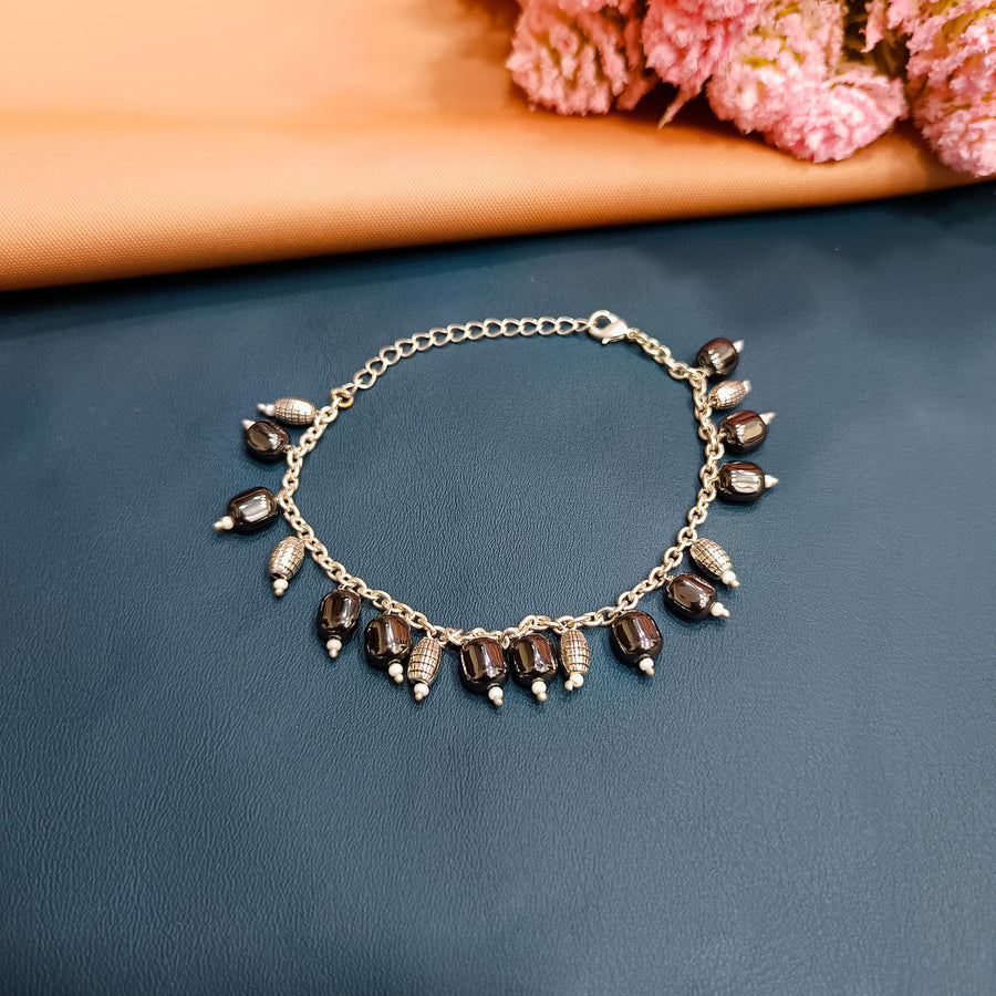 Elegant silver bracelet with a sleek design, perfect for everyday wear.