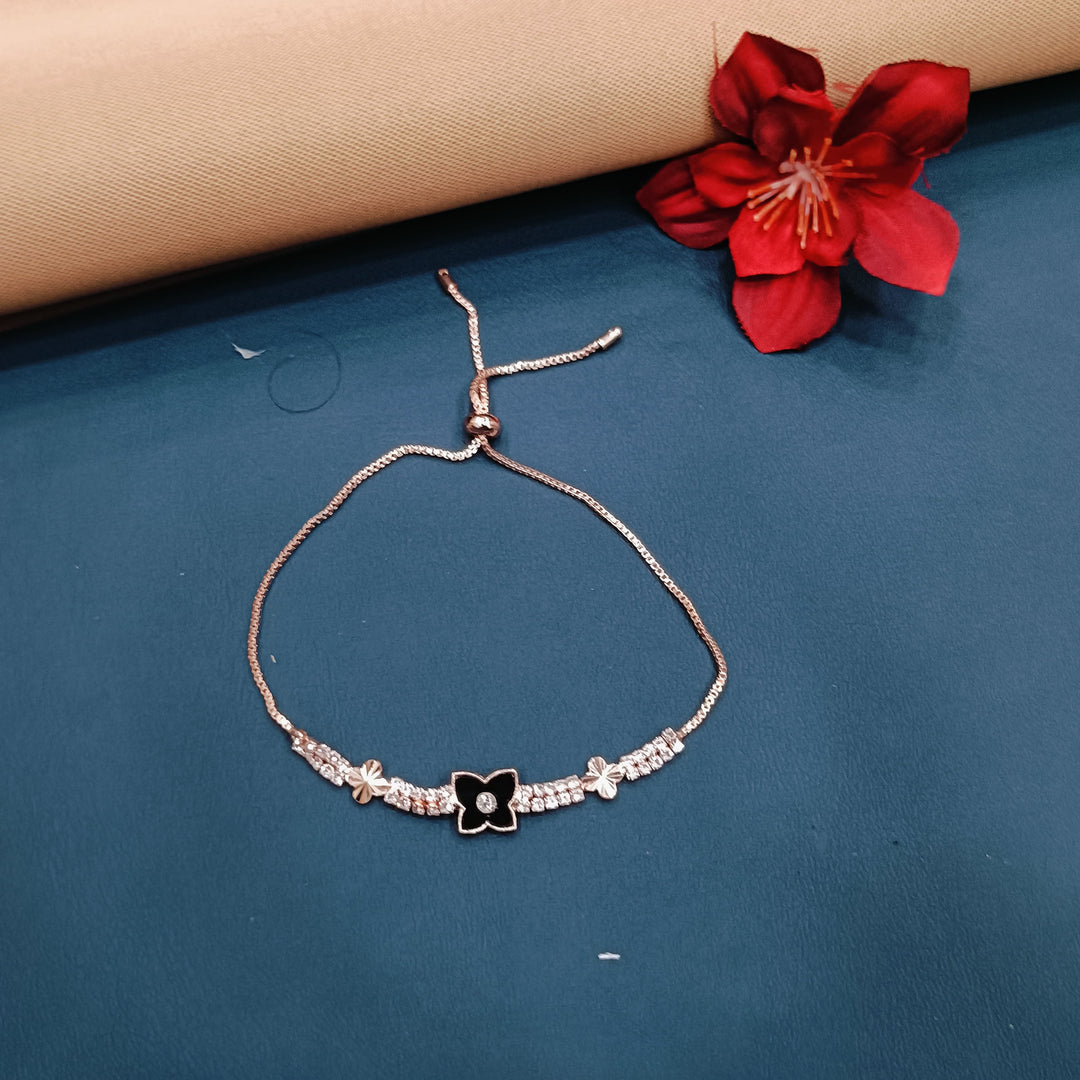 Dainty rose gold bracelet with a knot design, perfect for personal gifting.