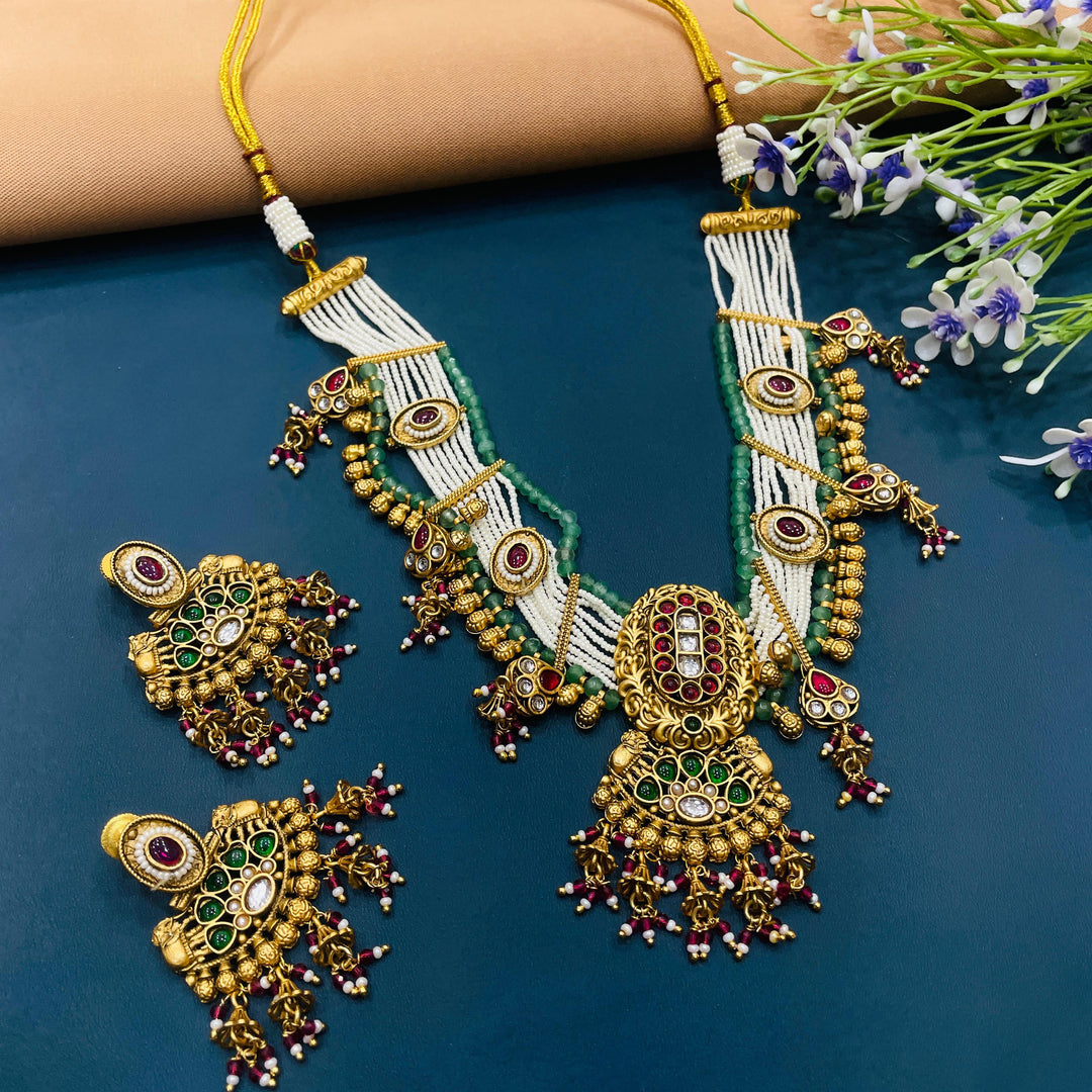 Traditional Indian choker in antique gold, ideal for elevating bridal and cultural outfits.