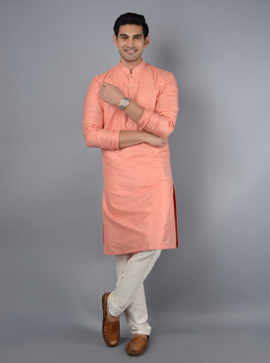 Comfortable Peach Kurta Set made from soft silk blend, ideal for festive occasions and family gatherings.