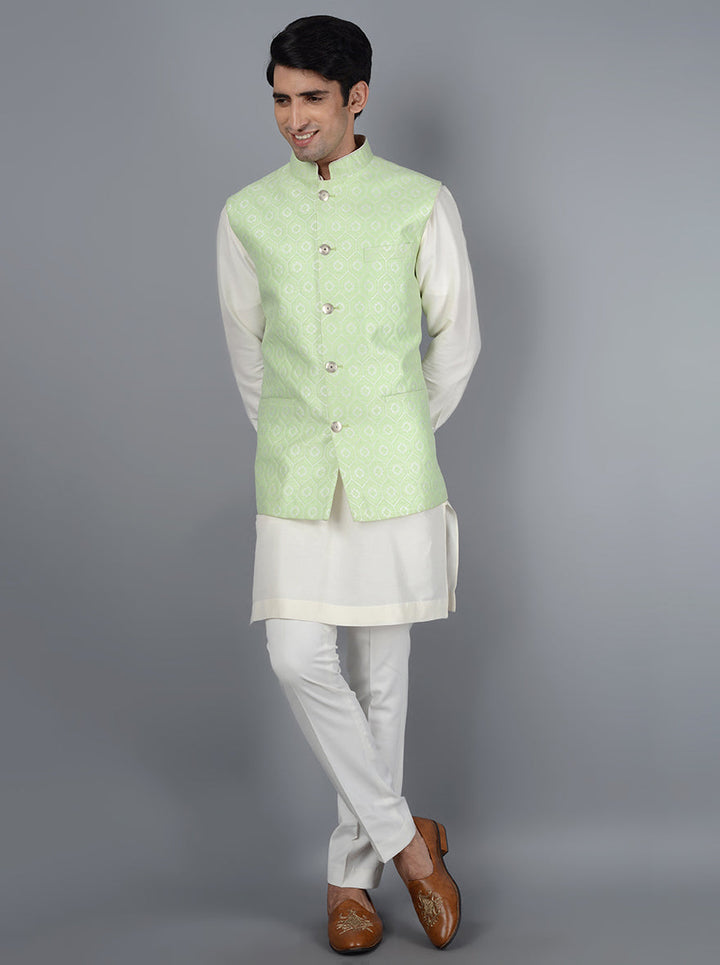 Pista jacquard Bandhgala jacket with self-design work, pockets, and a straight fit, perfect for adding style to wedding festivities and formal occasions.