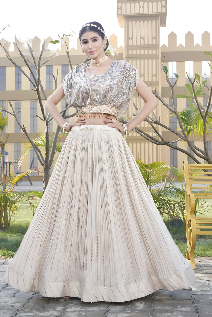 Stylish cream georgette crop top lehenga set, perfect for weddings and parties with its elegant design and fabric.