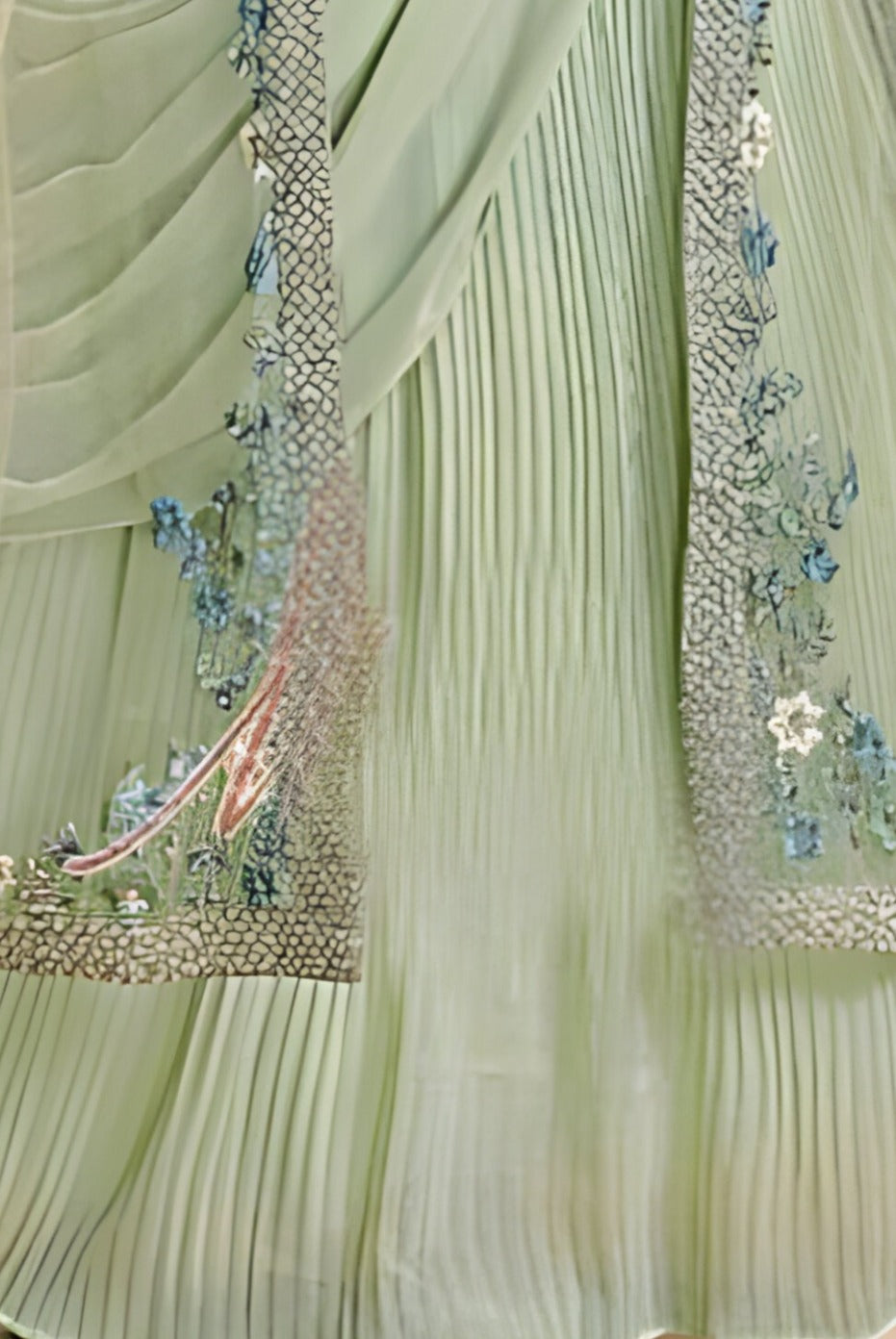 Stylish pista green wedding saree featuring contemporary Indo-Western style, perfect for elegant occasions and a chic blouse.