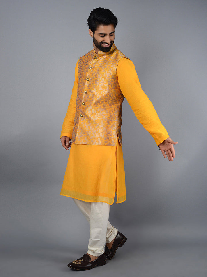 Luxurious golden yellow Bandhgala jacket designed for weddings and events, combining style and comfort effortlessly.